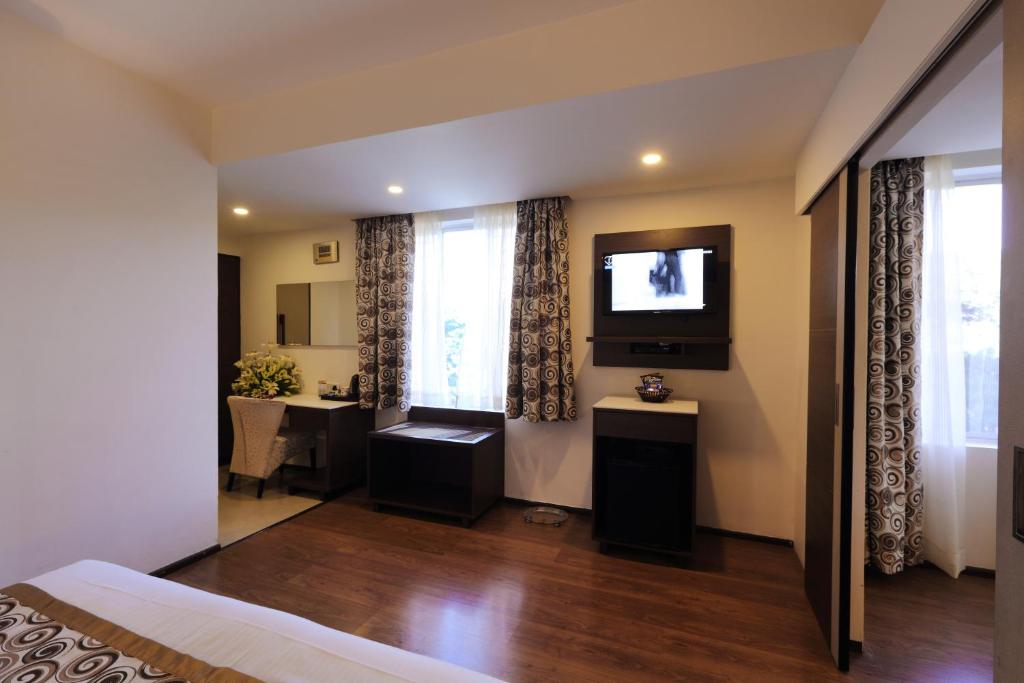 TV a/nebo společenská místnost v ubytování Hotel Pai Vista