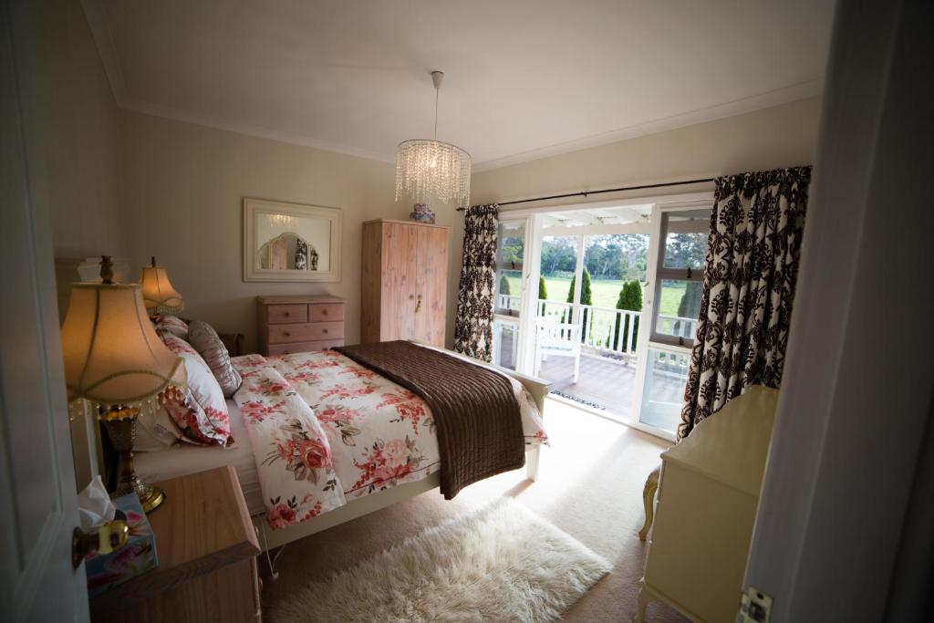 A bed or beds in a room at Parkfarm Views