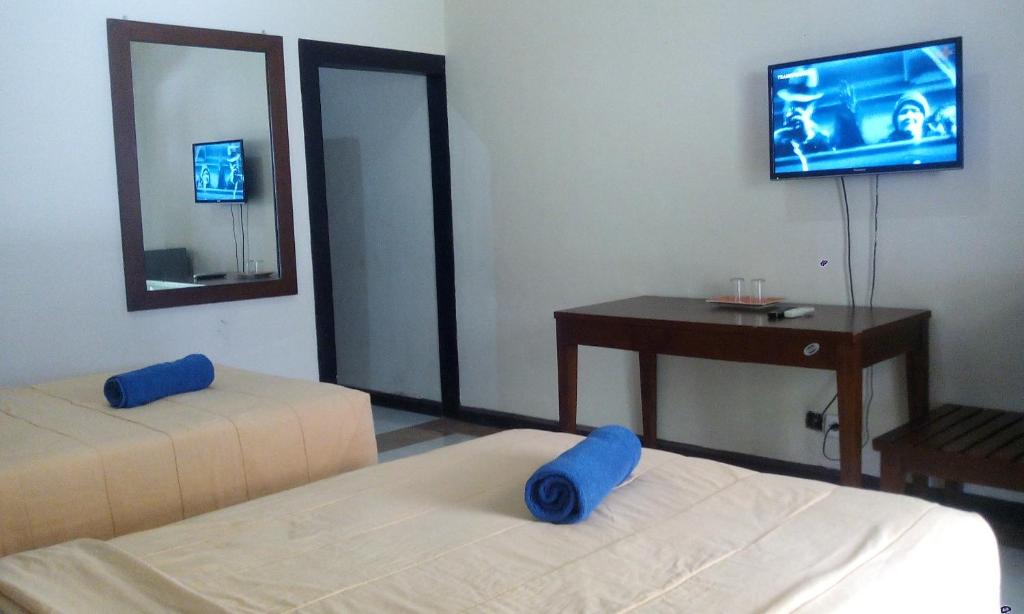Postel nebo postele na pokoji v ubytování Bali Diva Hotel Kuta