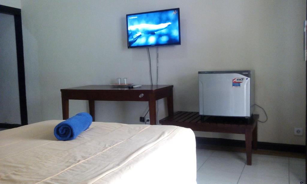 TV a/nebo společenská místnost v ubytování Bali Diva Hotel Kuta
