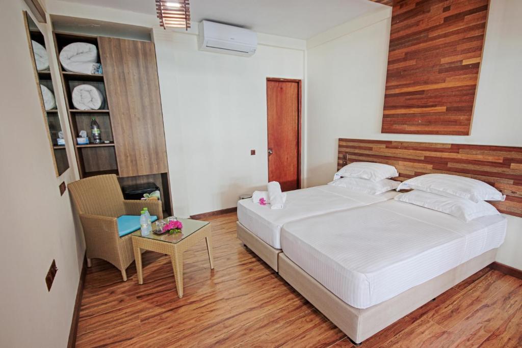 Postel nebo postele na pokoji v ubytování Kinan Retreat