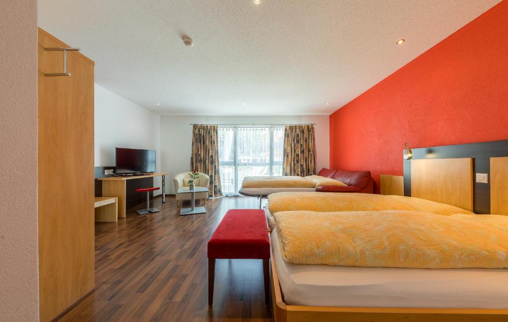 Postel nebo postele na pokoji v ubytování Hotel Blattnerhof
