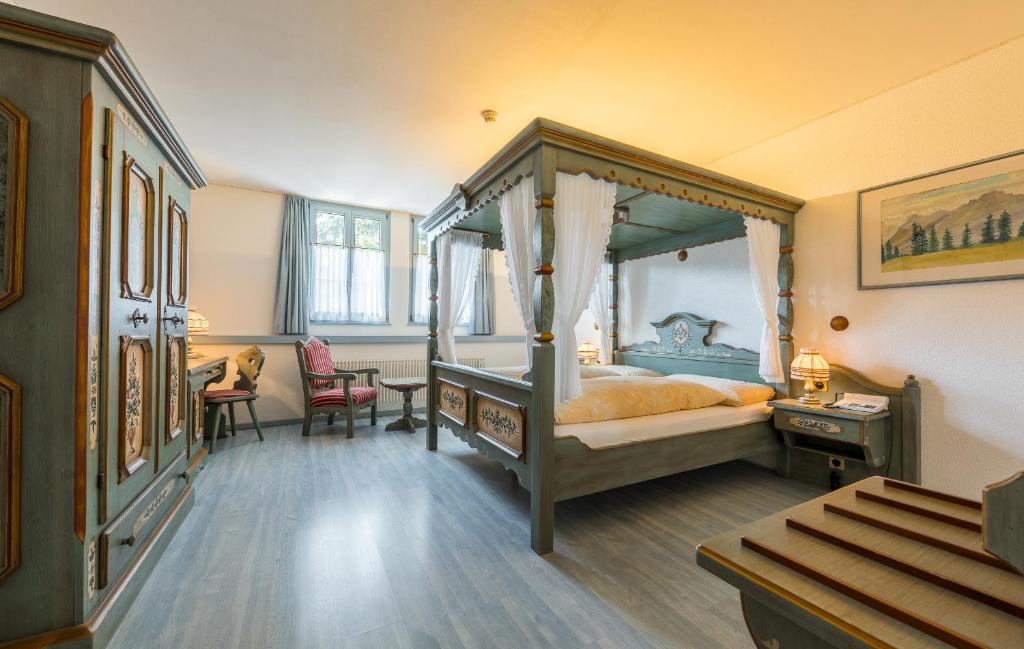 Postel nebo postele na pokoji v ubytování Hotel Blattnerhof