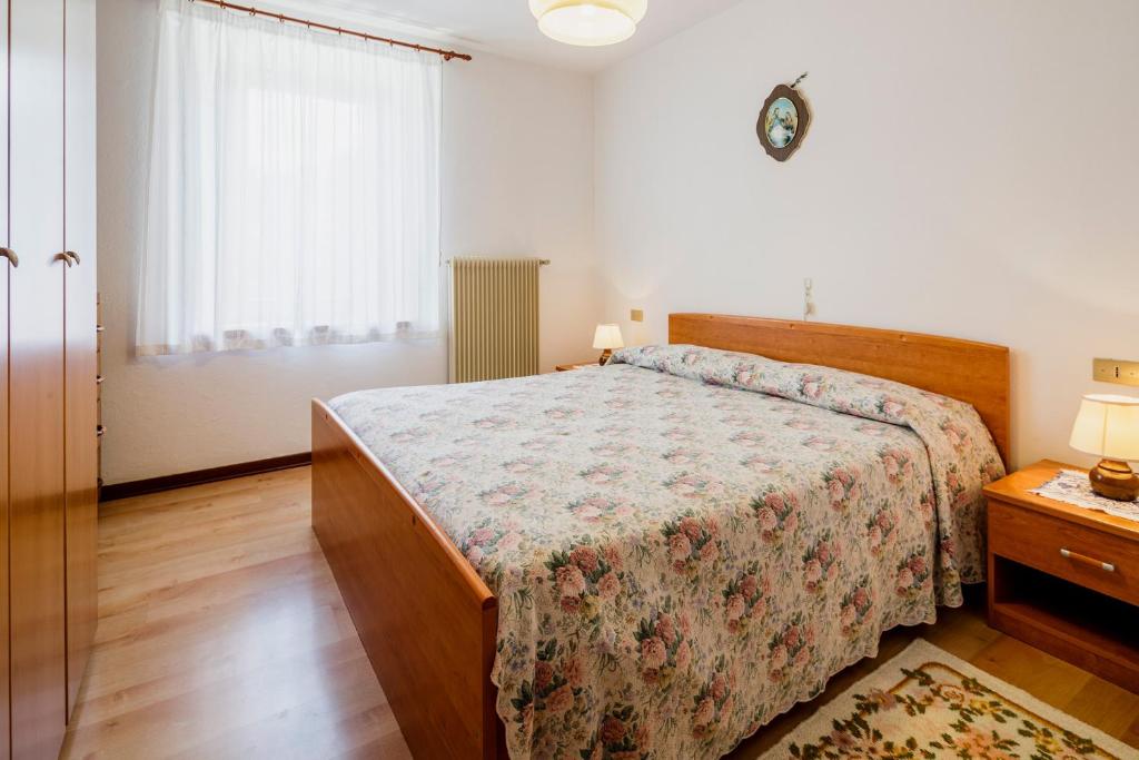 Łóżko lub łóżka w pokoju w obiekcie Appartamenti Kratter Sara