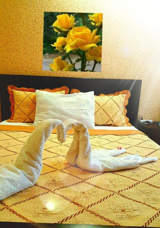 Postel nebo postele na pokoji v ubytování Hotel Sali