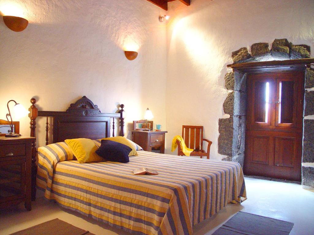 Postel nebo postele na pokoji v ubytování Casa Rural Finca Isabel