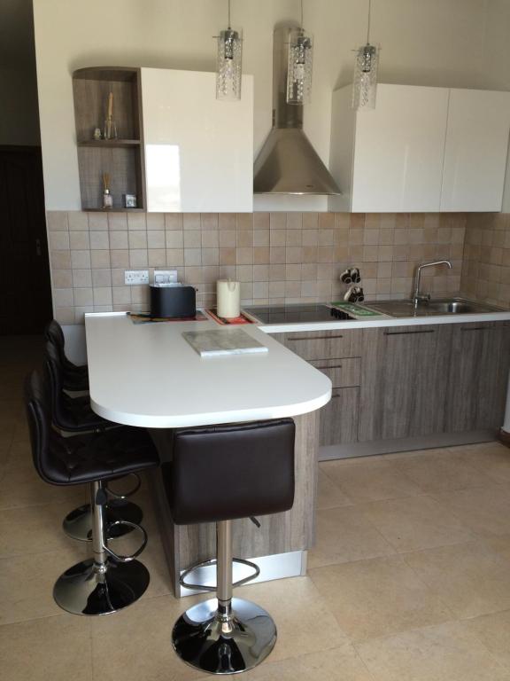 Kuchyň nebo kuchyňský kout v ubytování SEAVIEW Marsascala Apartment