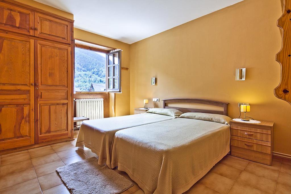 Postel nebo postele na pokoji v ubytování Apartamentos Salardu II