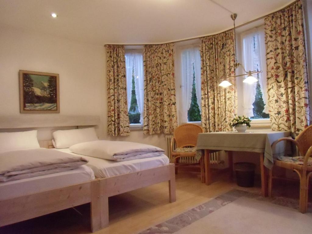 Postel nebo postele na pokoji v ubytování Hotel Villa Sisi