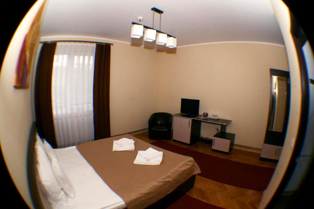 Postel nebo postele na pokoji v ubytování Vila Parc