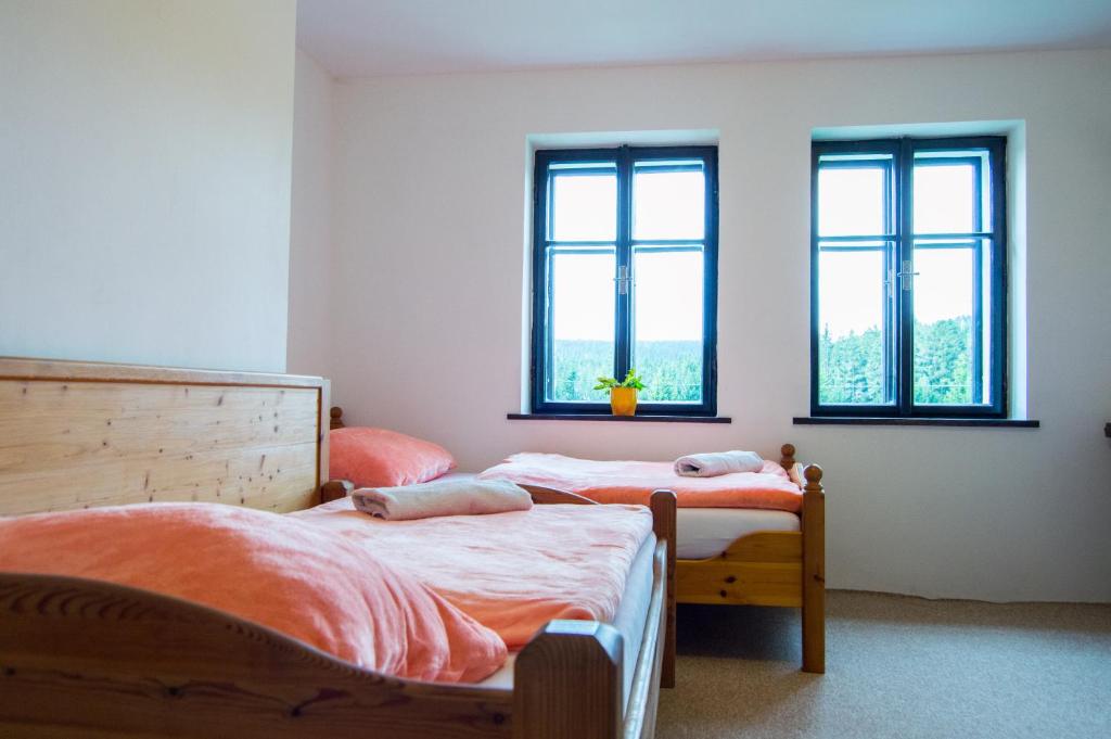 Postel nebo postele na pokoji v ubytování Apartment-Chalet-Chaloupka U Trnků