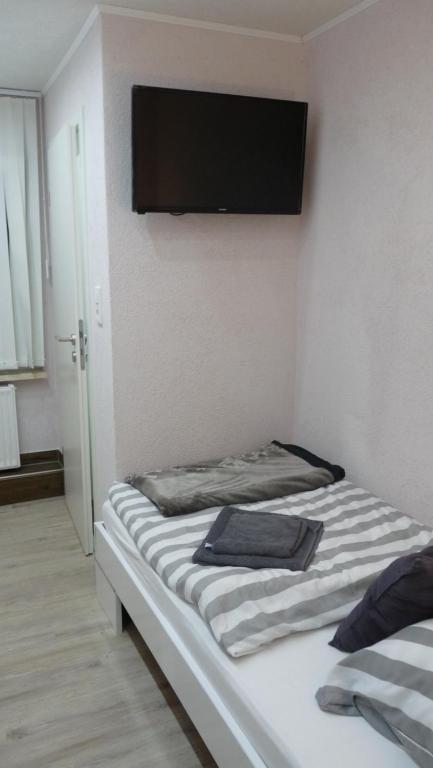 Postel nebo postele na pokoji v ubytování Hotel Rodizio UG