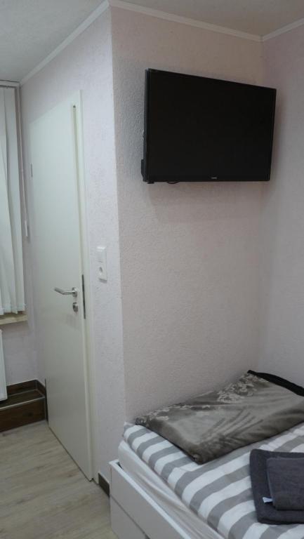 TV a/nebo společenská místnost v ubytování Hotel Rodizio UG