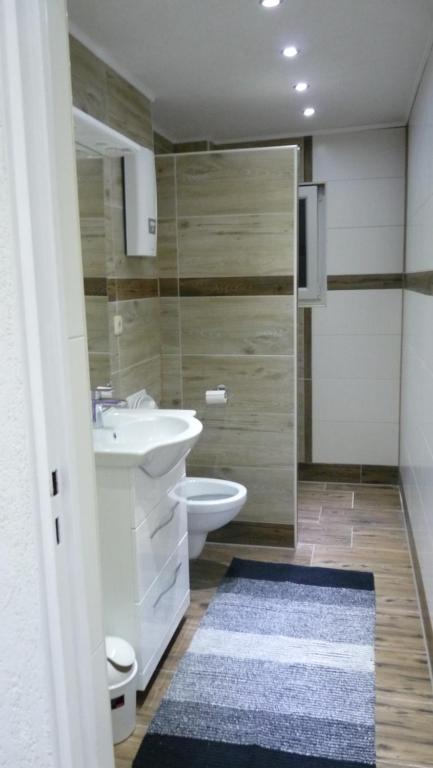 Koupelna v ubytování Hotel Rodizio UG