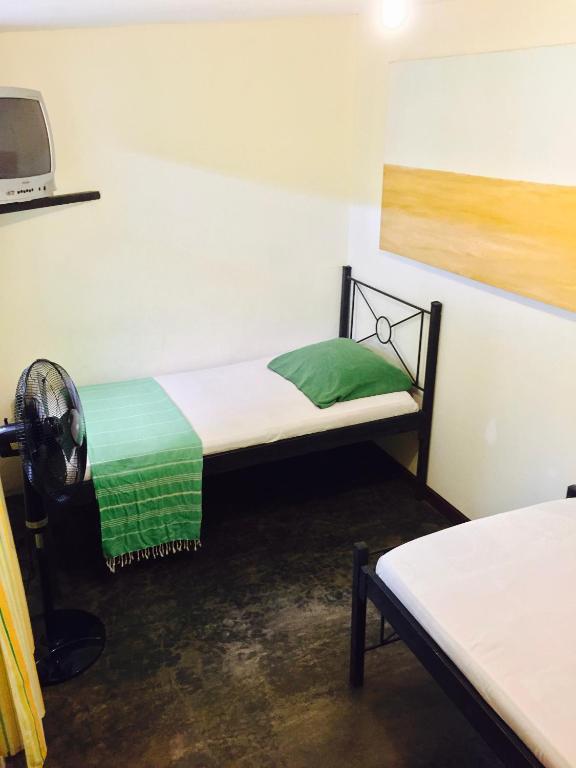 Postel nebo postele na pokoji v ubytování Hostel Dodero