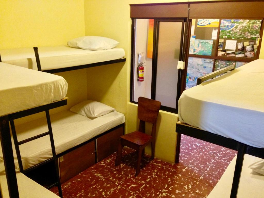 Postel nebo postele na pokoji v ubytování Hostel Dodero