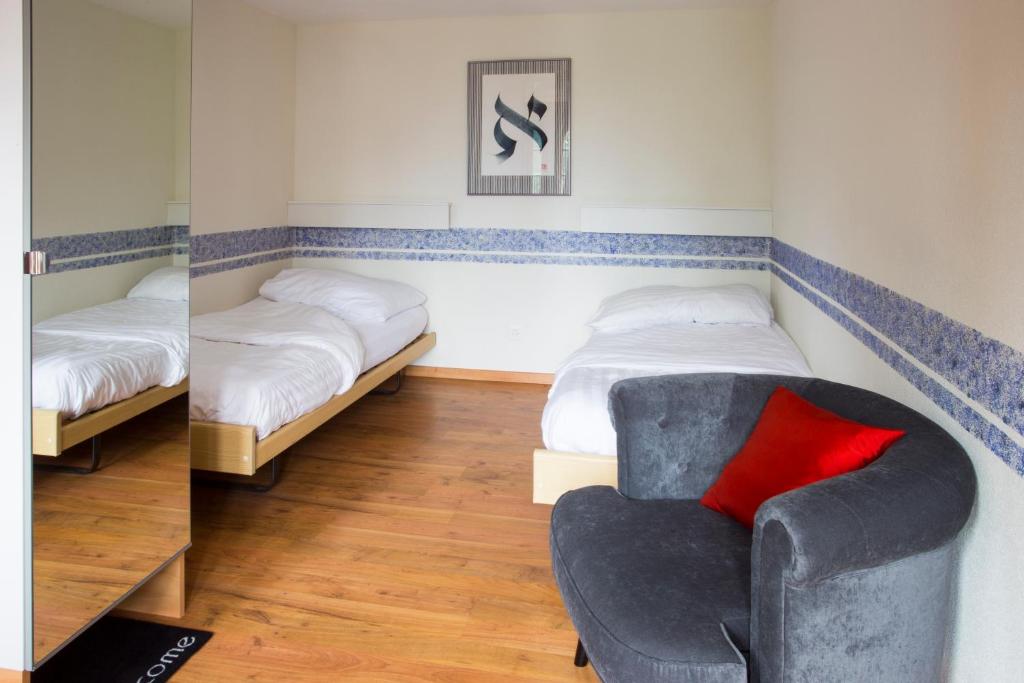 Letto o letti in una camera di Crêt-Bérard