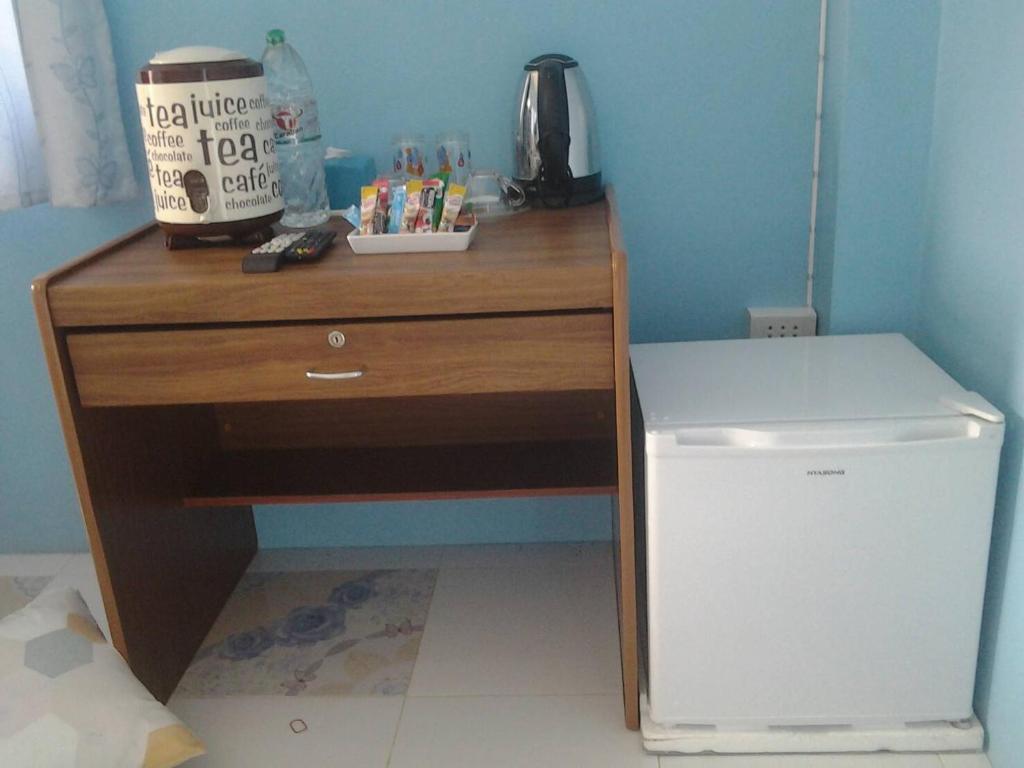 Kuchyň nebo kuchyňský kout v ubytování Chanakarn Guesthouse Sangkhla Buri