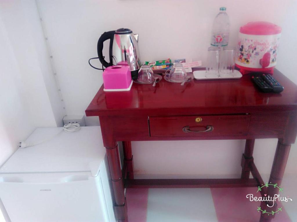 Kuchyň nebo kuchyňský kout v ubytování Chanakarn Guesthouse Sangkhla Buri