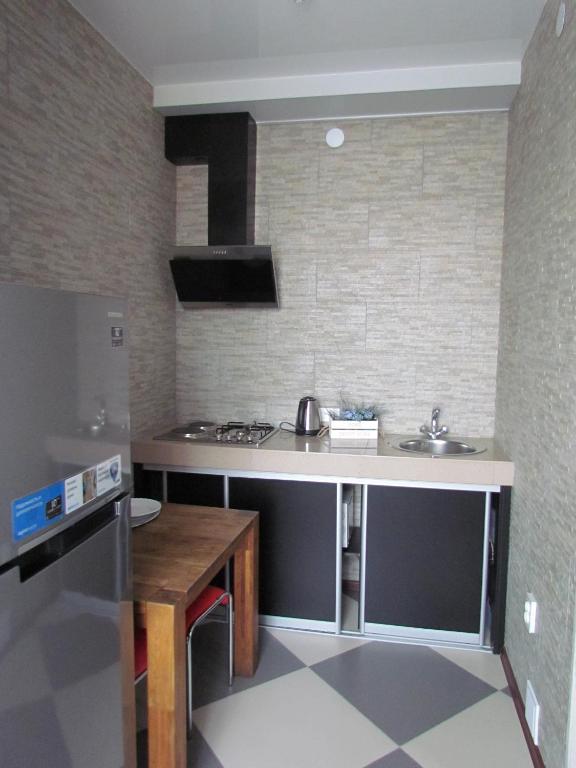 Kuchyň nebo kuchyňský kout v ubytování Guest house Khan
