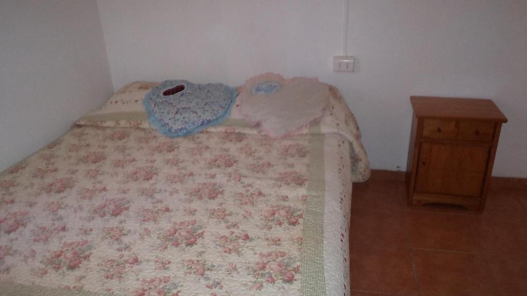 Postel nebo postele na pokoji v ubytování Hostal Las Kañas