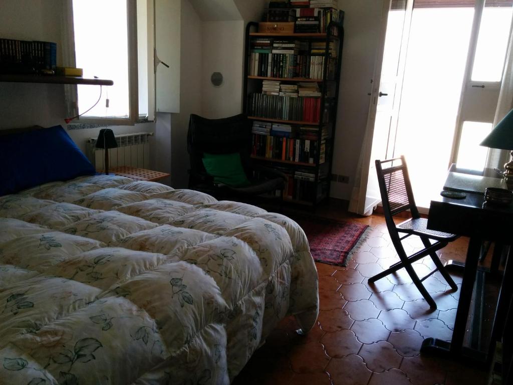 Postel nebo postele na pokoji v ubytování Casa Pierini