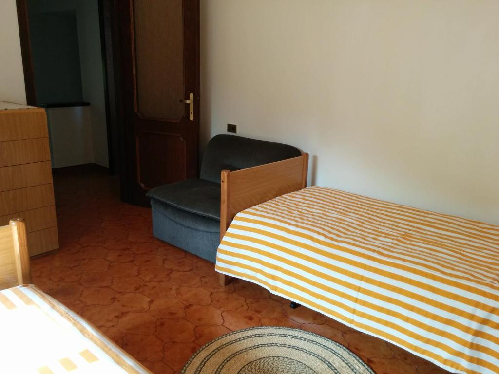 Postel nebo postele na pokoji v ubytování Casa Pierini
