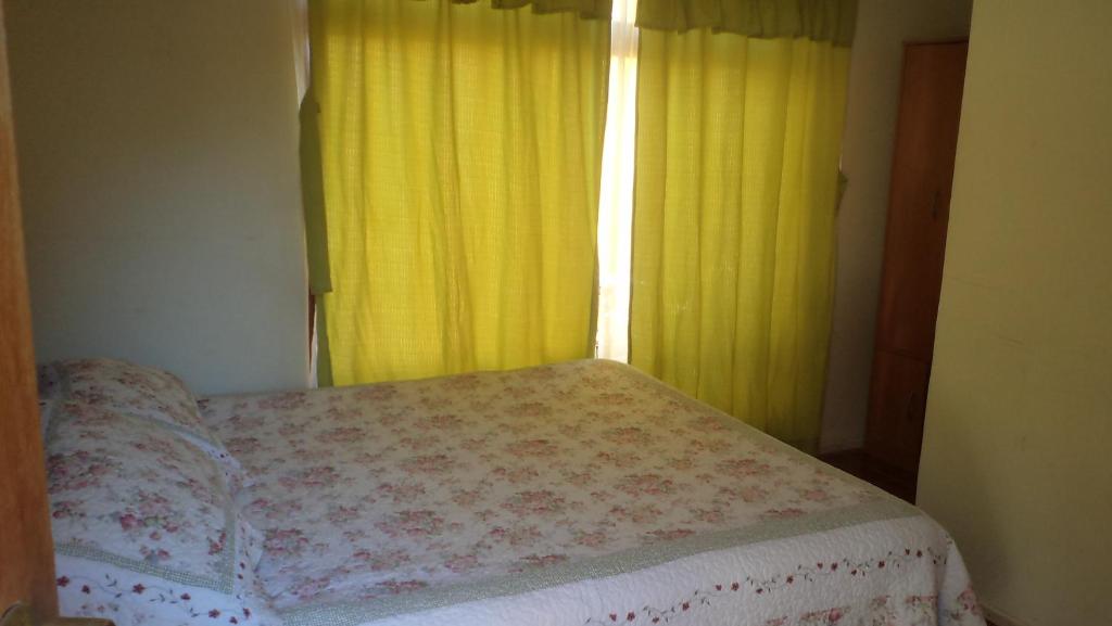 Postel nebo postele na pokoji v ubytování Hostal Las Kañas