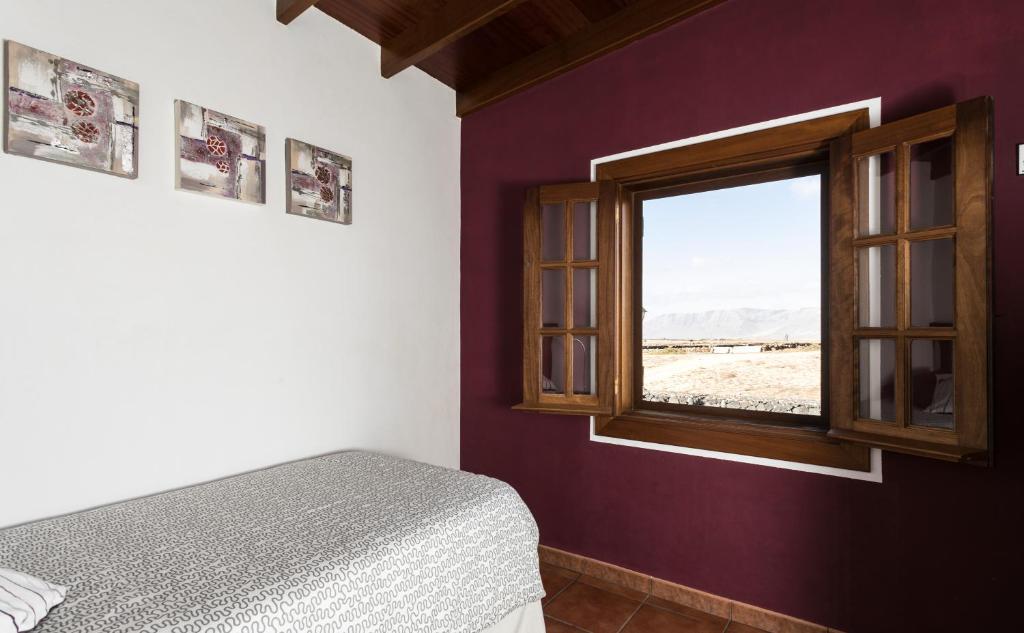 Postel nebo postele na pokoji v ubytování Villa El Jable Lanzarote