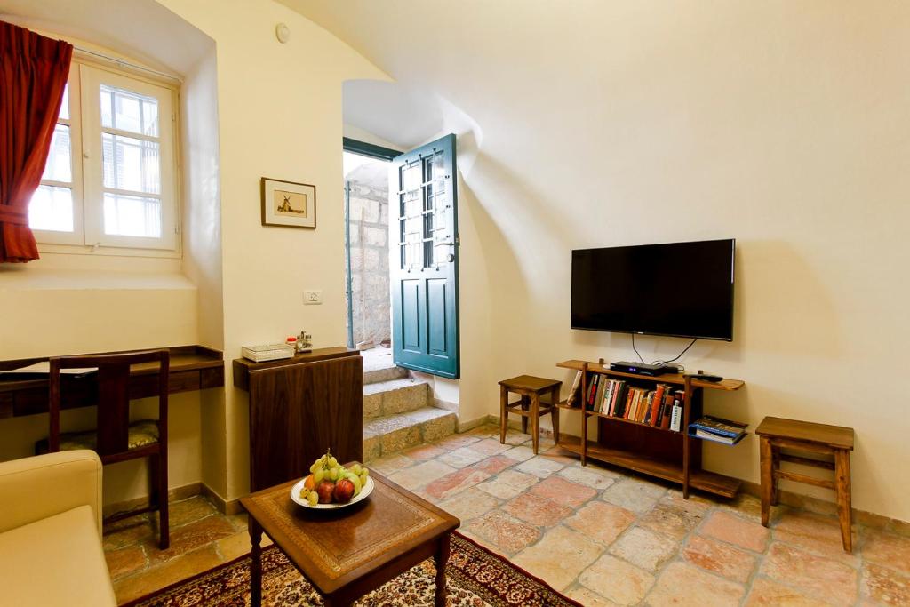 TV a/nebo společenská místnost v ubytování The Templer Inn