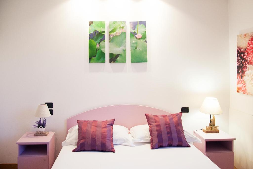 Postel nebo postele na pokoji v ubytování B&B Botton D'Oro Basiglio