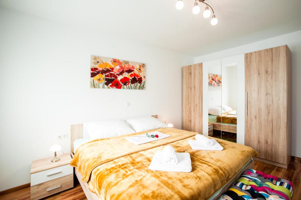 Кровать или кровати в номере Apartment Magic