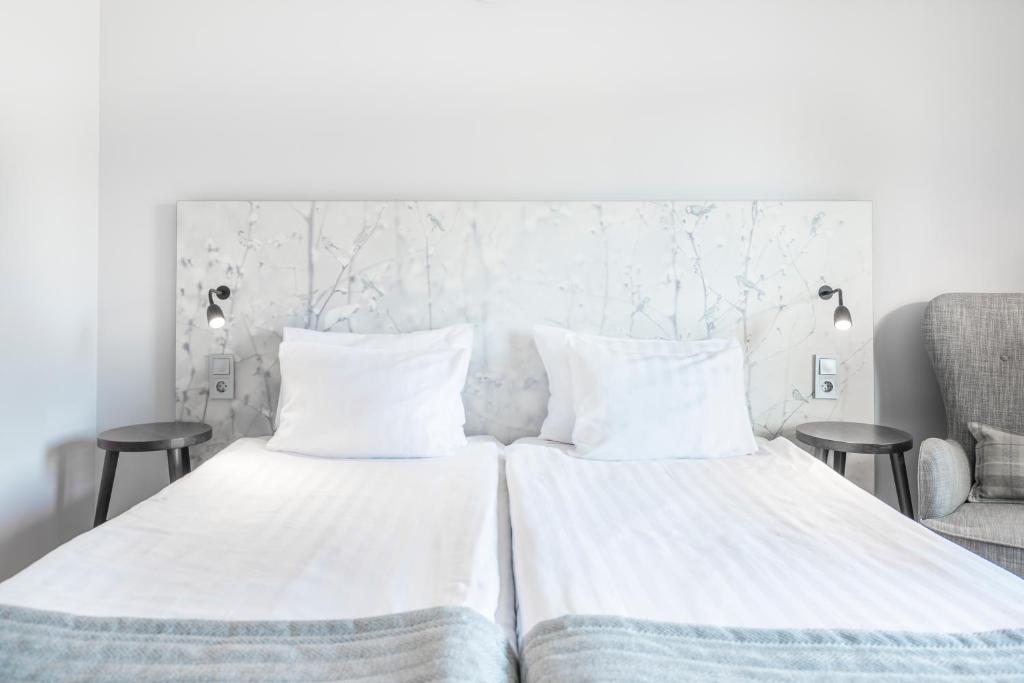 Postel nebo postele na pokoji v ubytování Quality Hotel Ekoxen