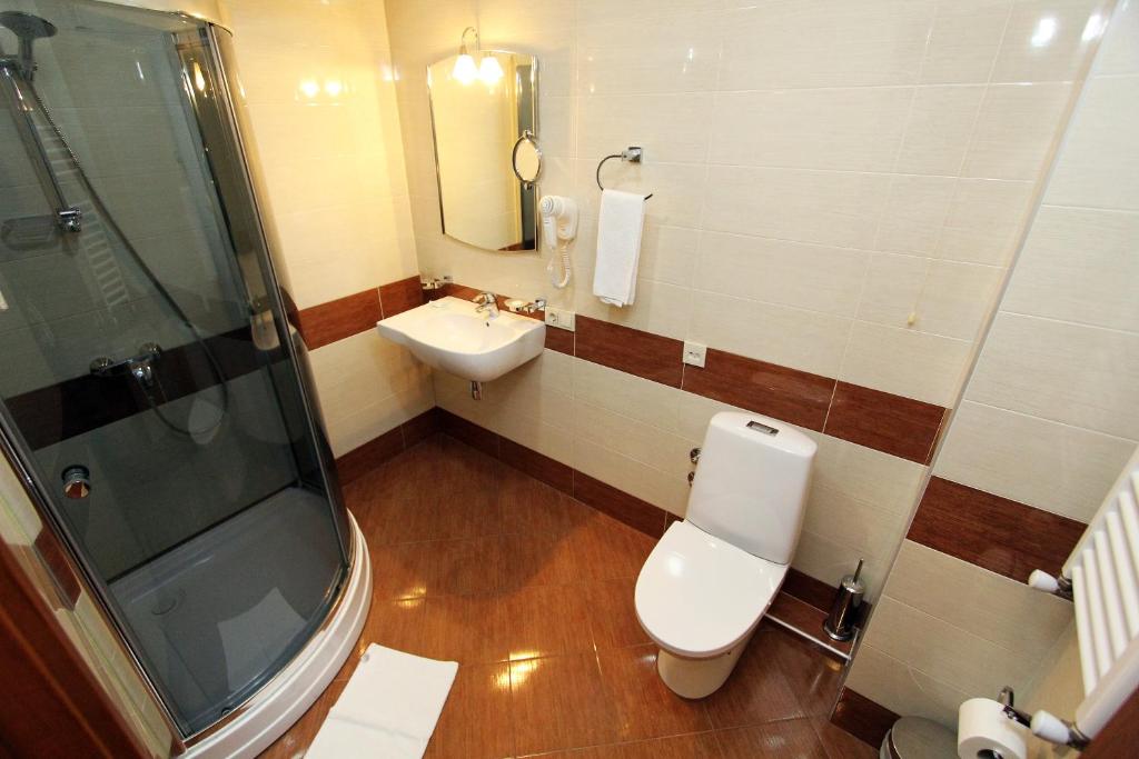 Koupelna v ubytování Batesta Hotel