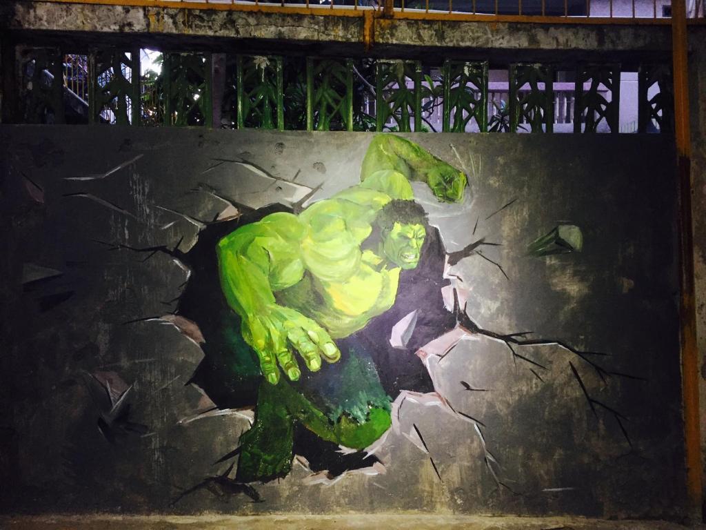 a painting of the hulk on a wall at No. 6 Cuobian Hostel in Shantou