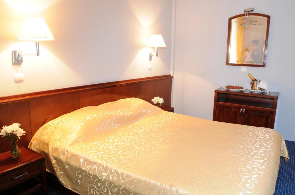 Postel nebo postele na pokoji v ubytování Hotel Norcev