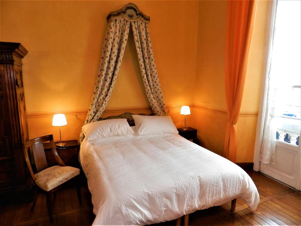 Postel nebo postele na pokoji v ubytování Bigo Guest House