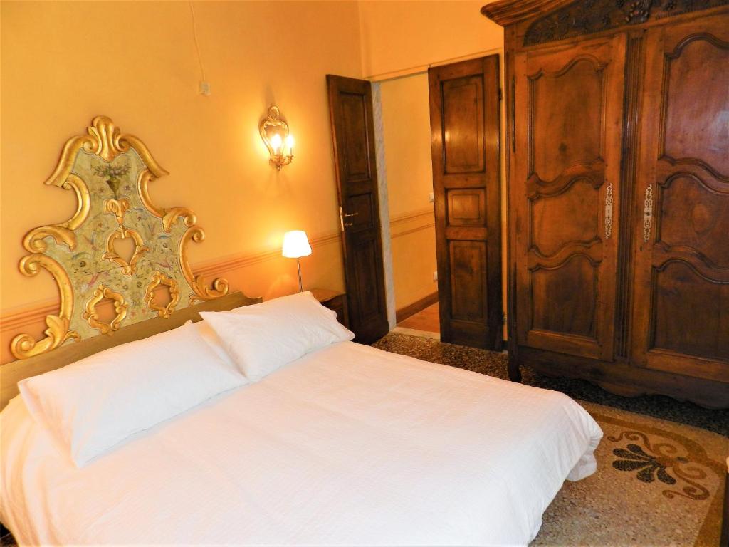 Postel nebo postele na pokoji v ubytování Bigo Guest House