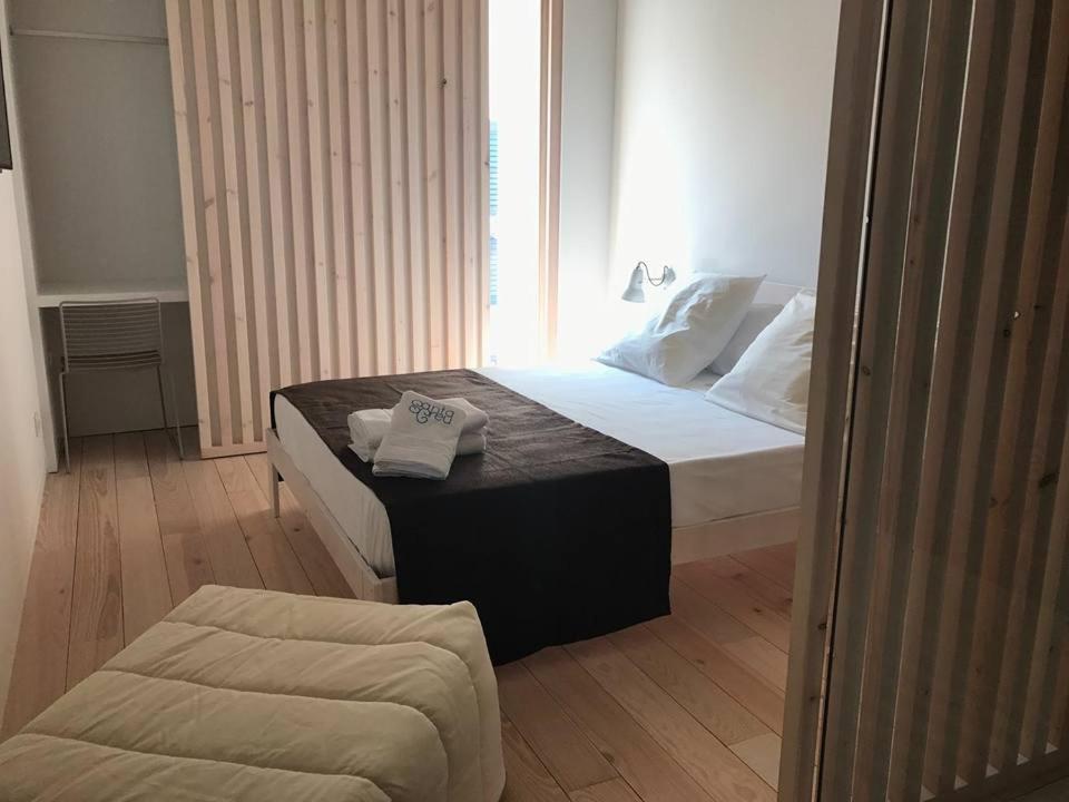 Posteľ alebo postele v izbe v ubytovaní Hotel Santacreu