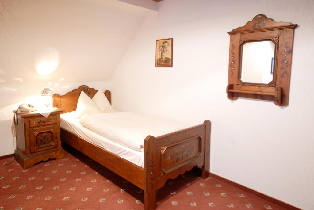Postel nebo postele na pokoji v ubytování Hotel Gondel