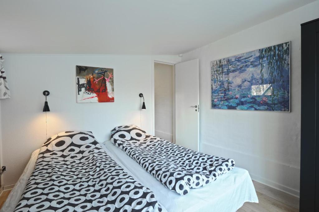 Postel nebo postele na pokoji v ubytování Strandens Apartment