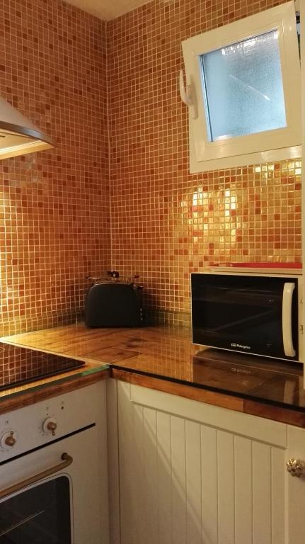 Kuchyňa alebo kuchynka v ubytovaní Estudio Jazmin