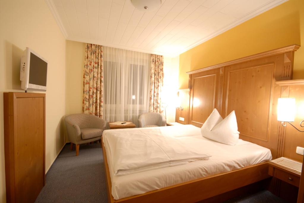 Postel nebo postele na pokoji v ubytování Hotel Gondel