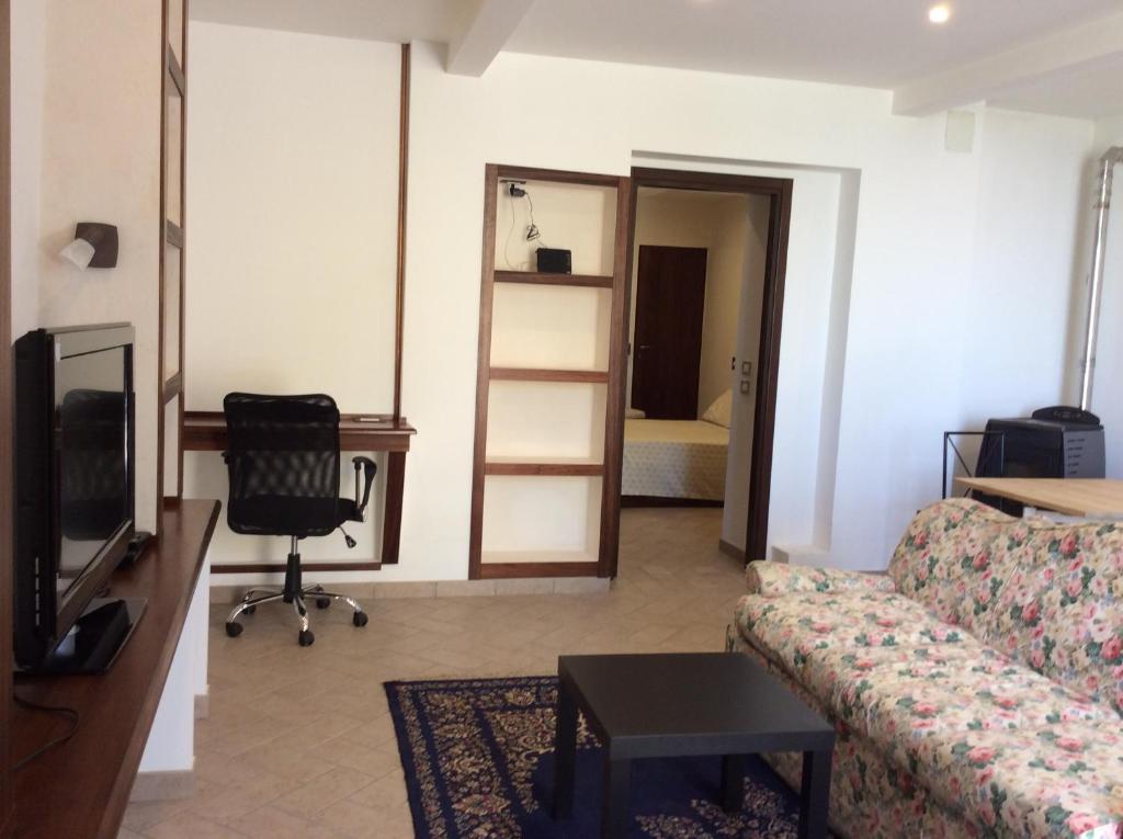 TV a/nebo společenská místnost v ubytování I Rondoni B&B