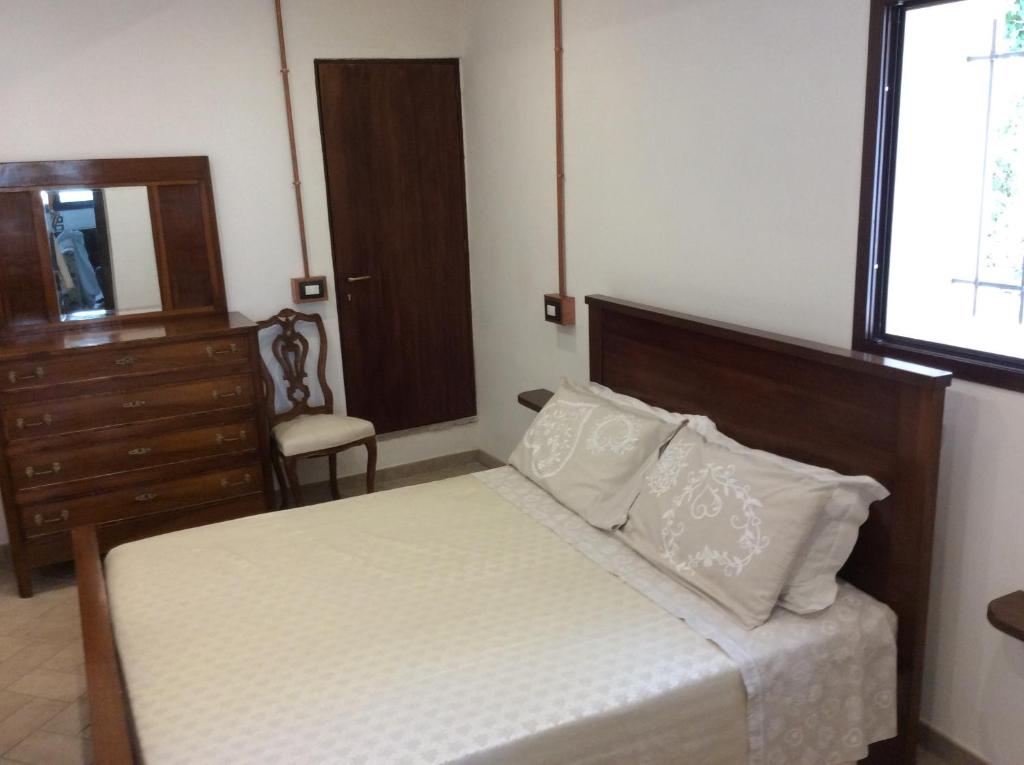 Postel nebo postele na pokoji v ubytování I Rondoni B&B
