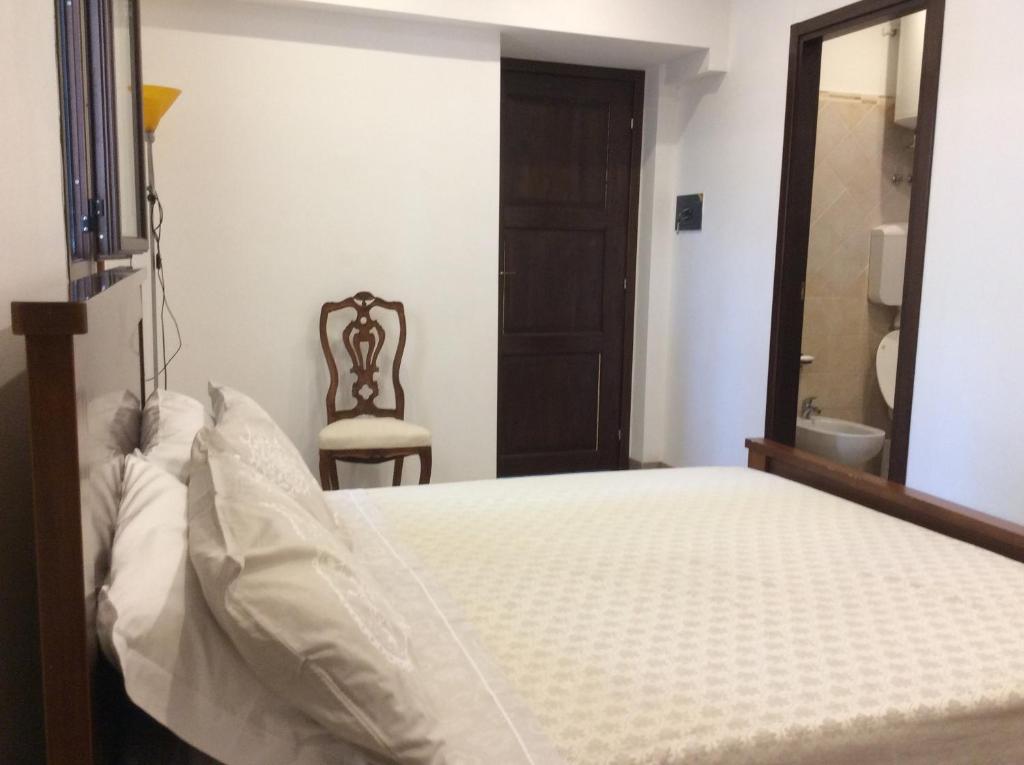 Postel nebo postele na pokoji v ubytování I Rondoni B&B