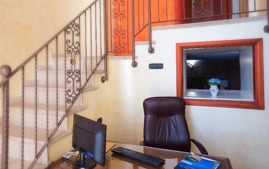 TV a/nebo společenská místnost v ubytování B&B Fior Tramonti