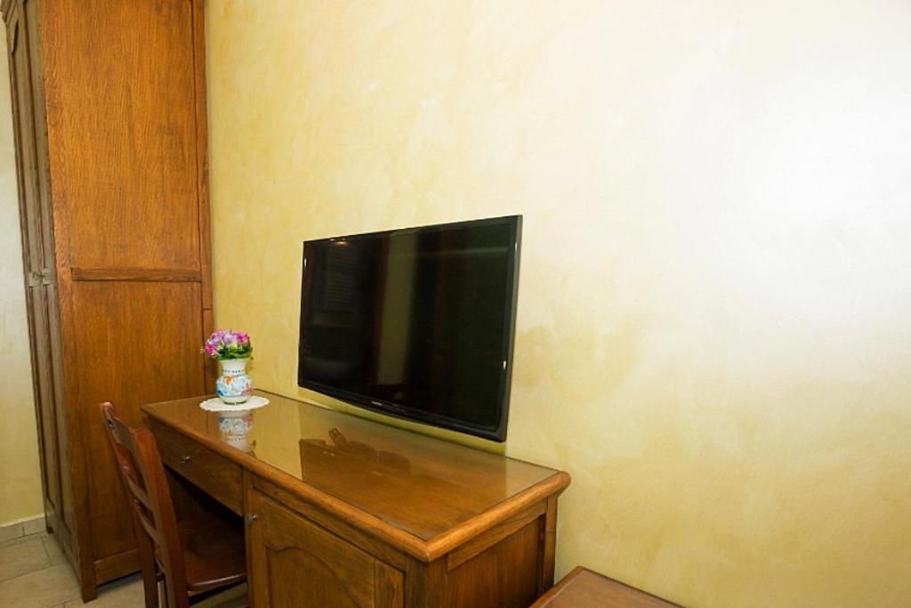 TV a/nebo společenská místnost v ubytování B&B Fior Tramonti