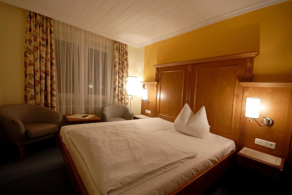 Postel nebo postele na pokoji v ubytování Hotel Gondel