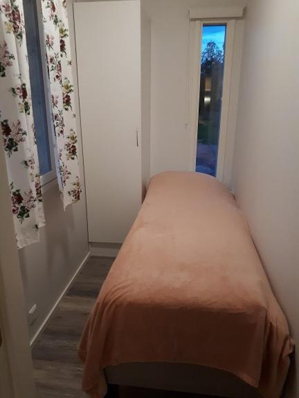 Postel nebo postele na pokoji v ubytování Camping Tornio